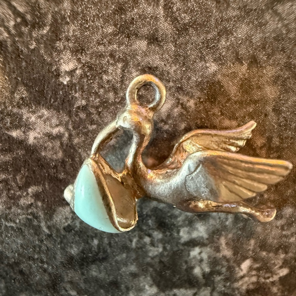 Vintage sterling silver stork pendant.